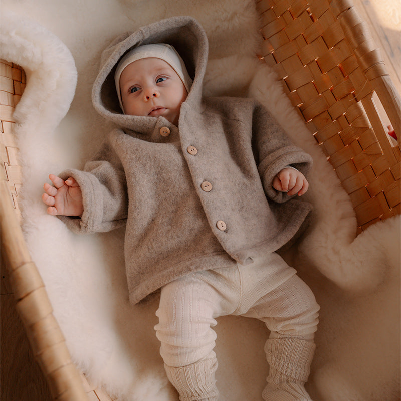 Babytights i ull med silke hullmønster