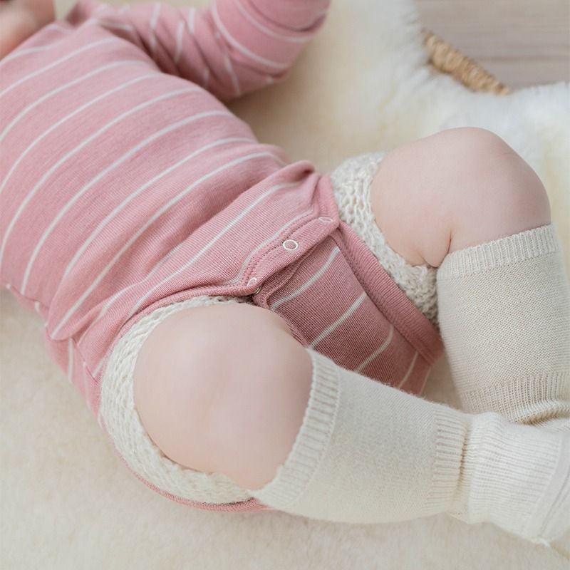 Body i ull med silke - Lys rose/natur
